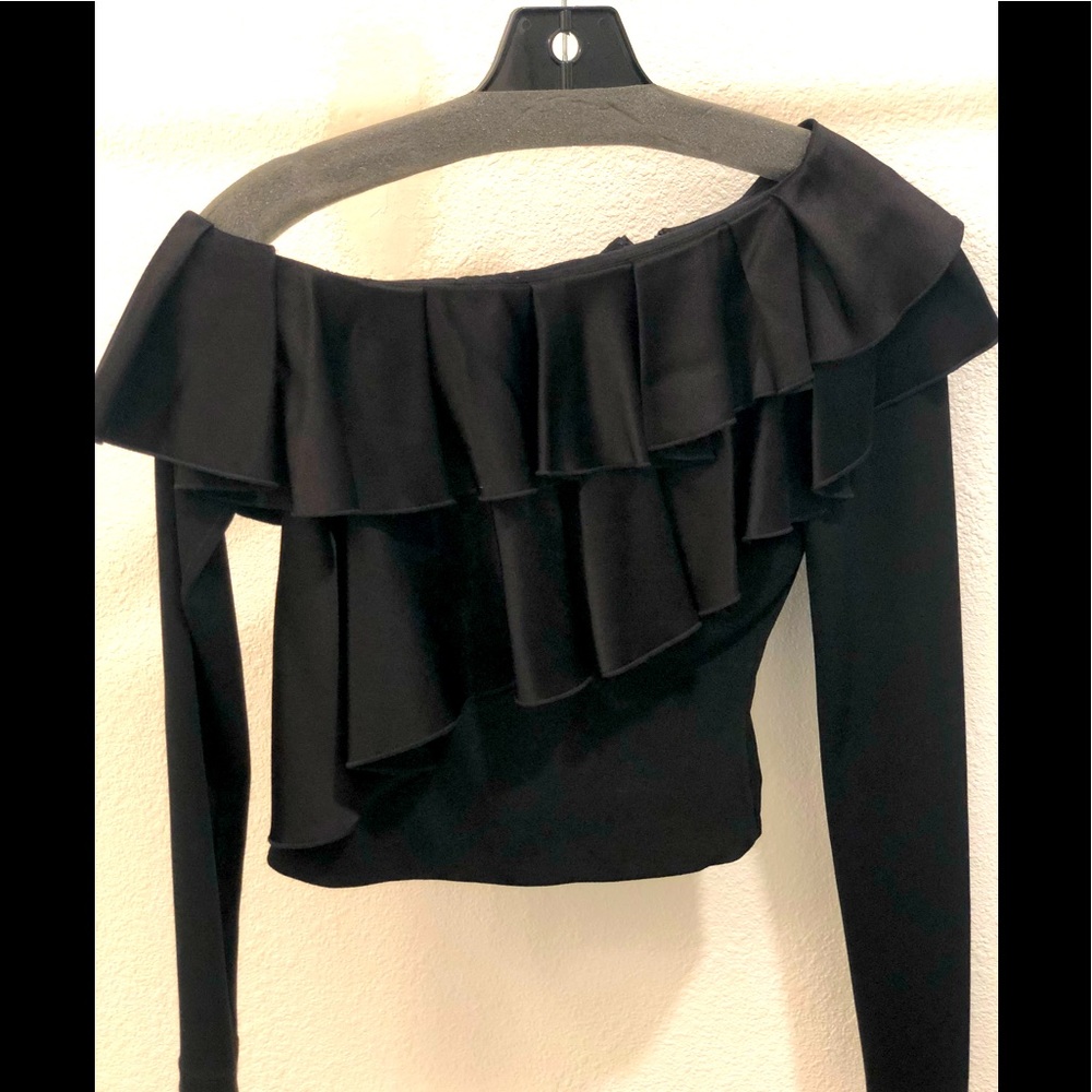 Black long sleeve cropped top with ruffle detail